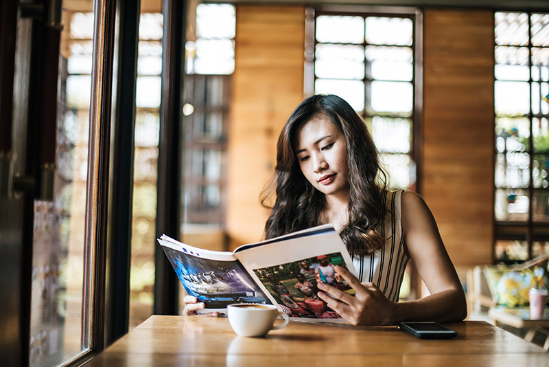 Woman Reading a Magazine